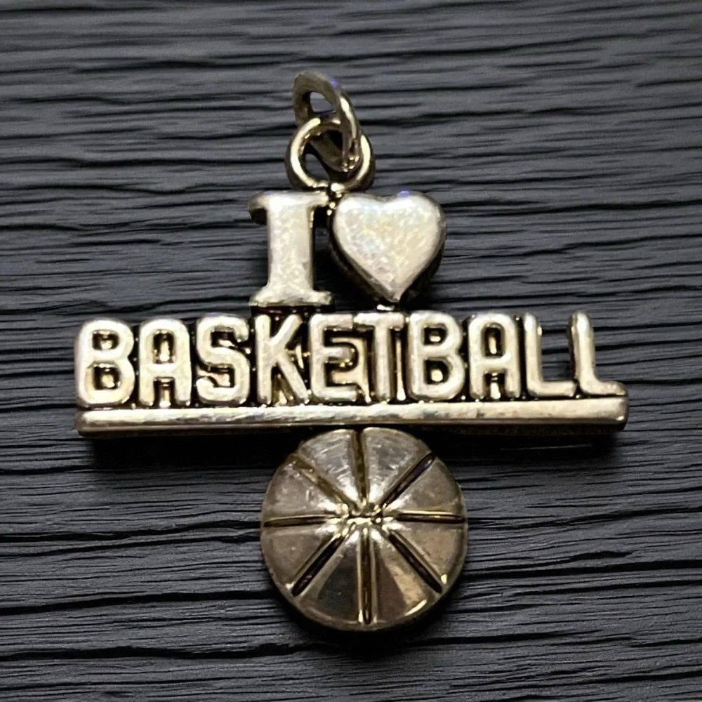Silver Basketball Pendant Signed “Best”